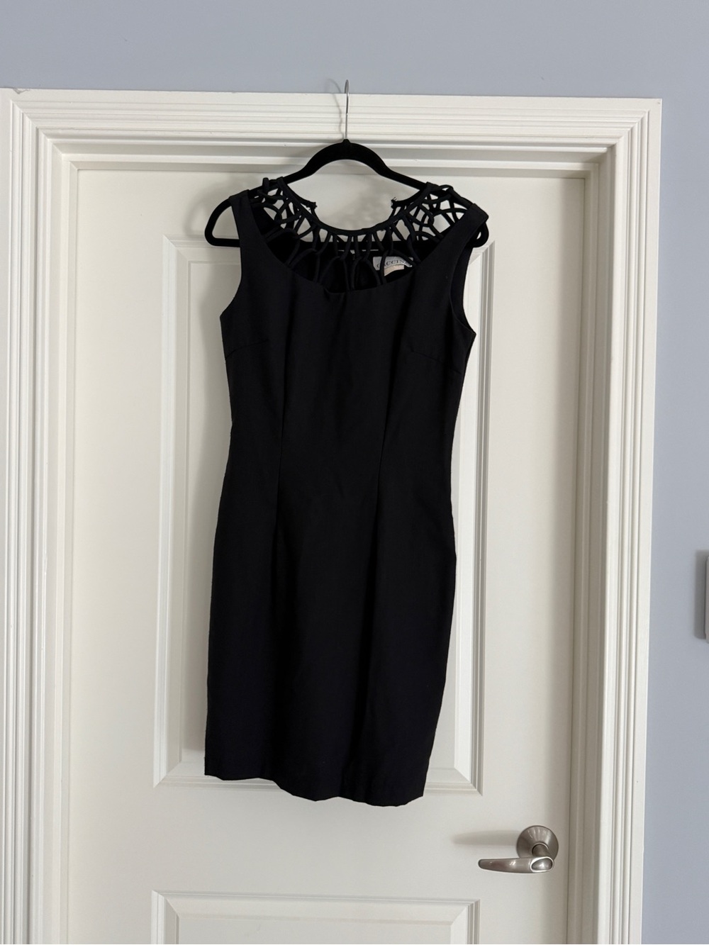 Sleeveless Black Mini Dress with Decorative Cutout Yoke